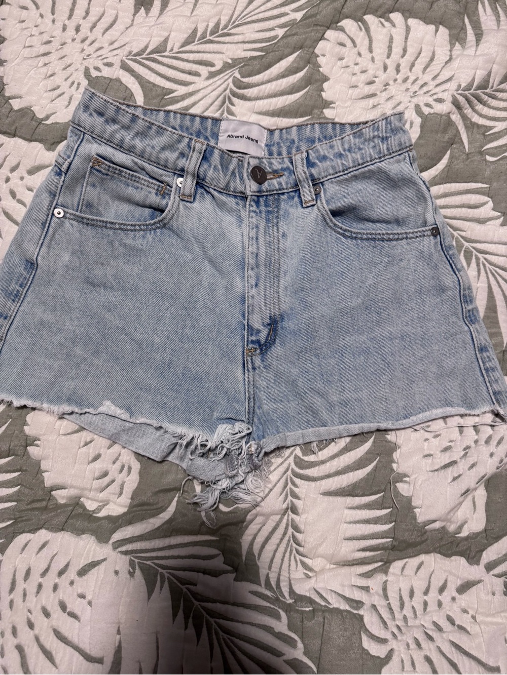 Abrand "A High Relaxed Short" in a light vintage blue wash. Size 26.